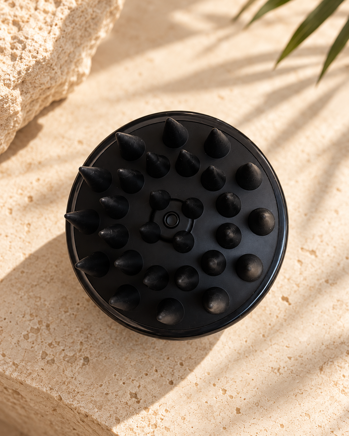 Massagepunten aan de onderzijde van de Scalp Brush